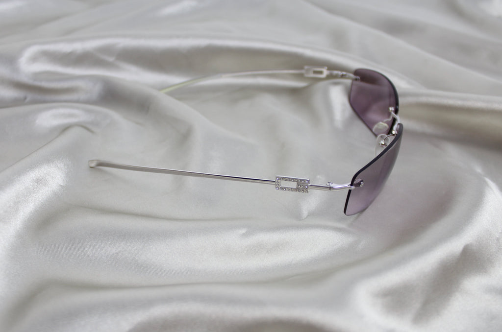 Gucci Purple Rimless Rhinestone Sunglasses